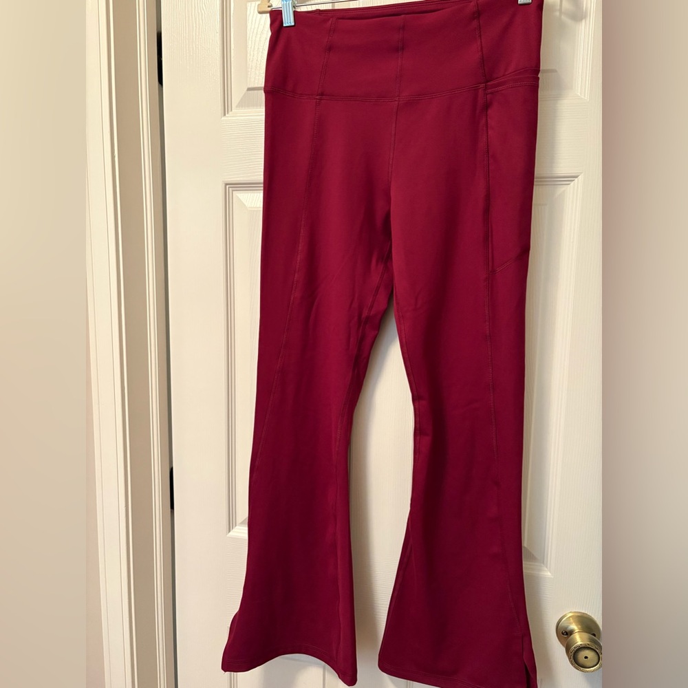 Women’s size medium Raspberry color split leg leggings